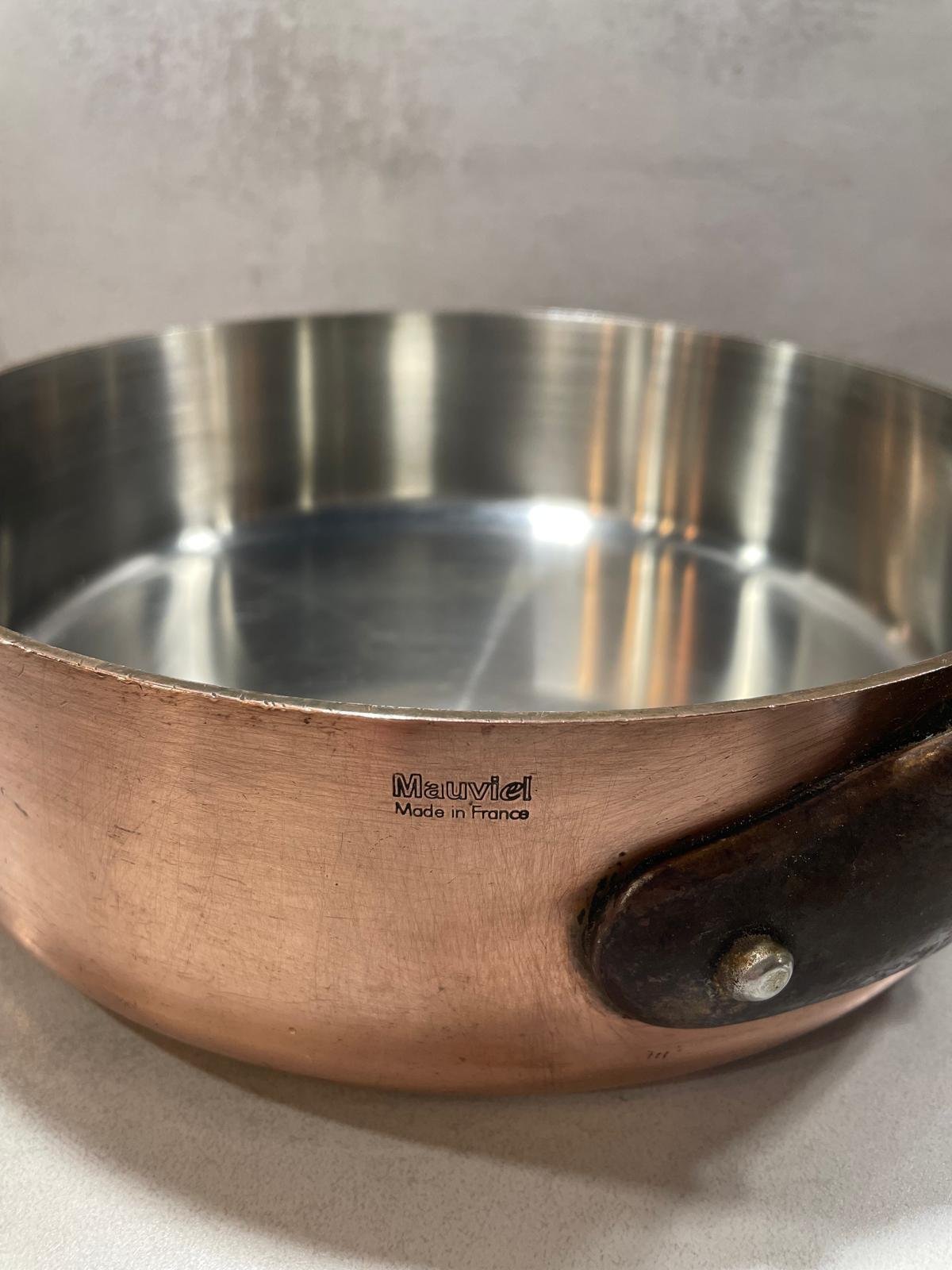 Mauviel / Made in France maker’s mark on a copper sauté pan previously sourced by Cook & Collect.