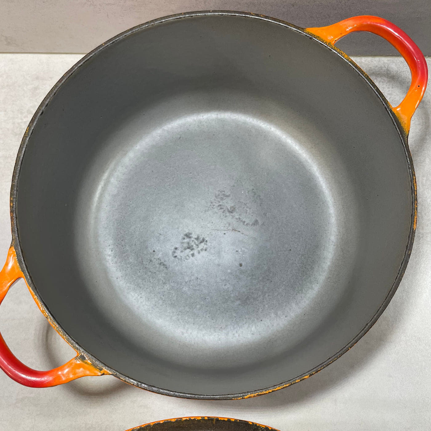 Grey enamel interior of an early Le Creuset round cocotte