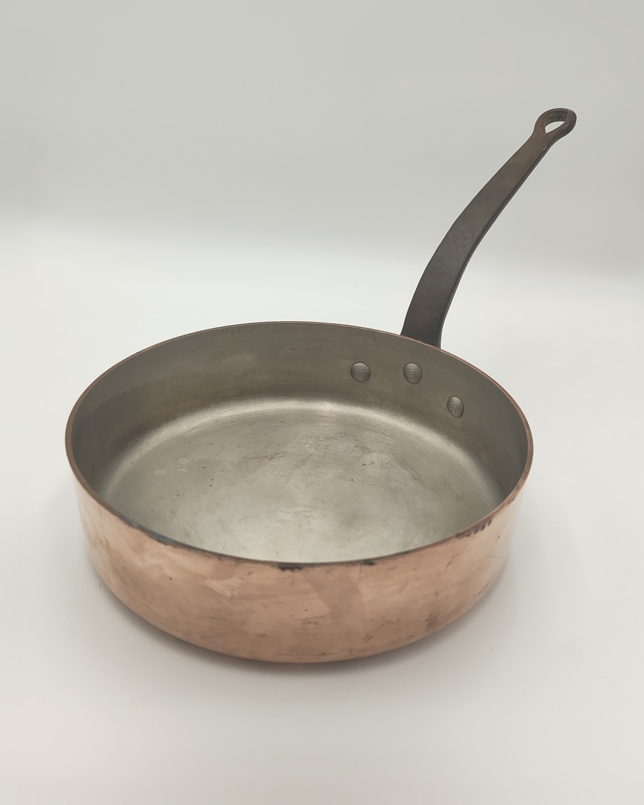 E. Dehillerin 29 cm tinned copper sauté pan with iron handle, three-quarter view