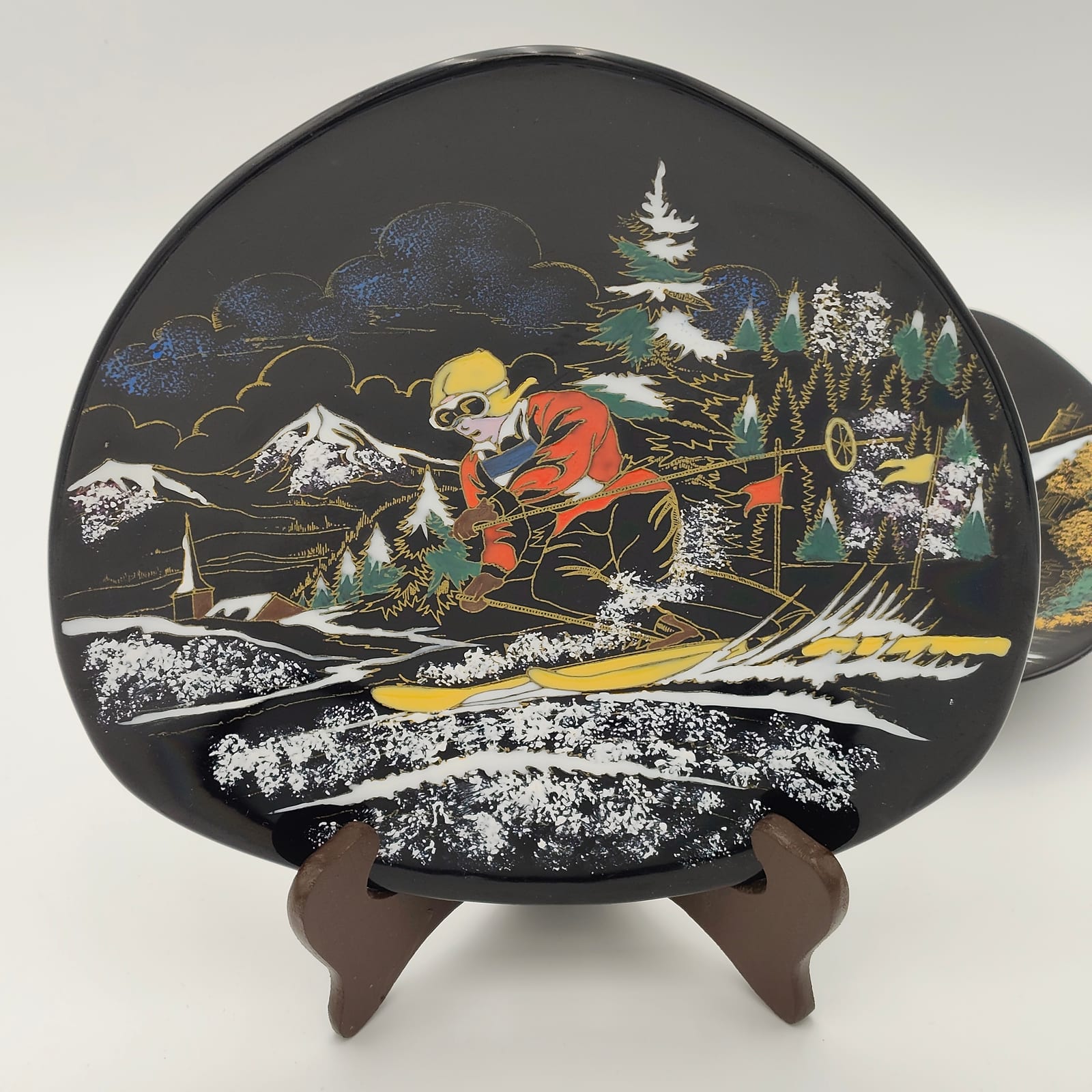 Pair of Longwy Hand-Painted Faience Dishes, Skier and Watermill, Black Ground, France — 3