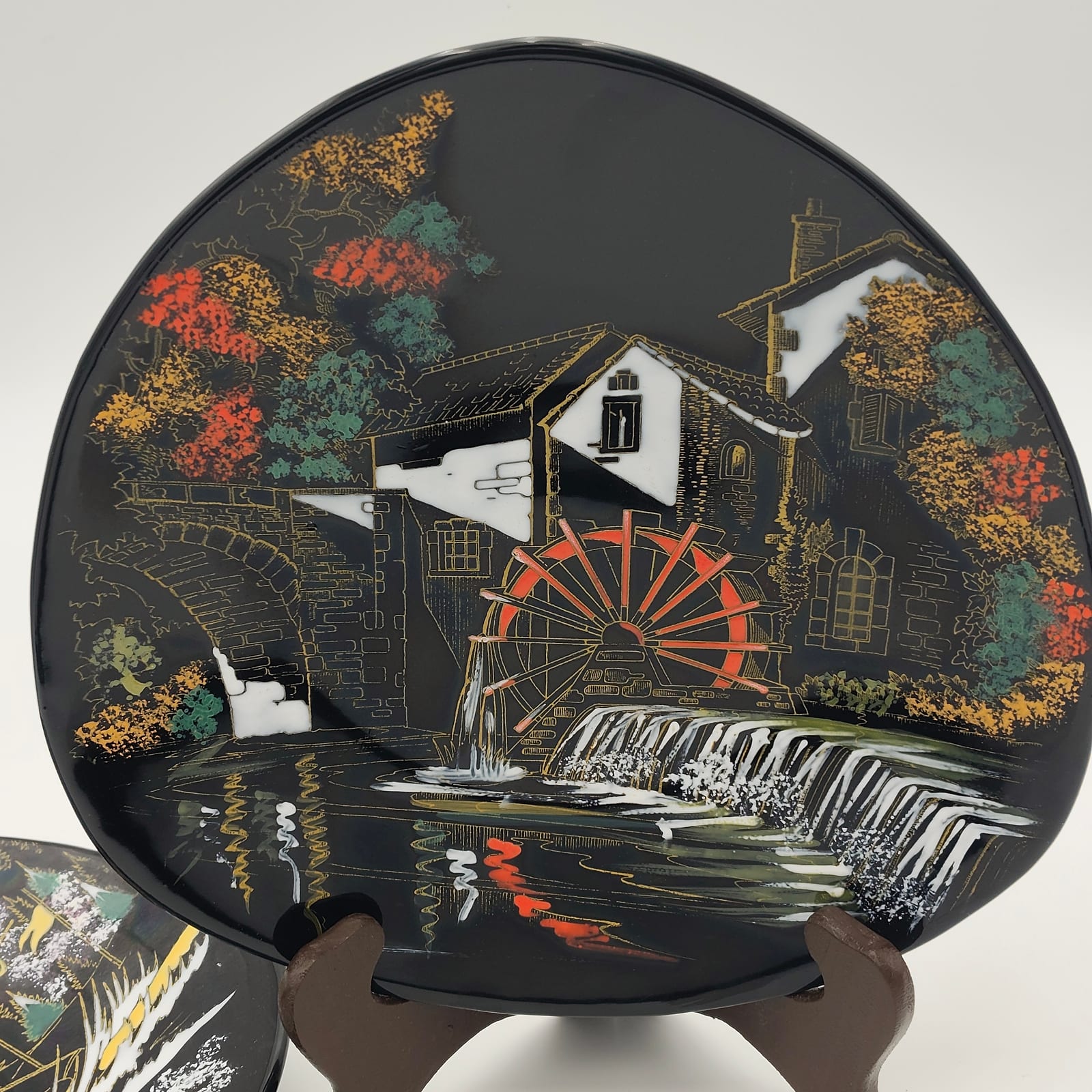 Pair of Longwy Hand-Painted Faience Dishes, Skier and Watermill, Black Ground, France — 4